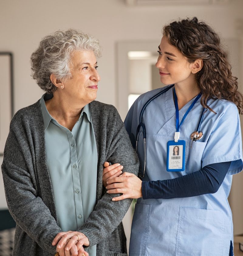 Caregiver Assist Senior Woman at Home Caregiver Assist Senior Woman at Home