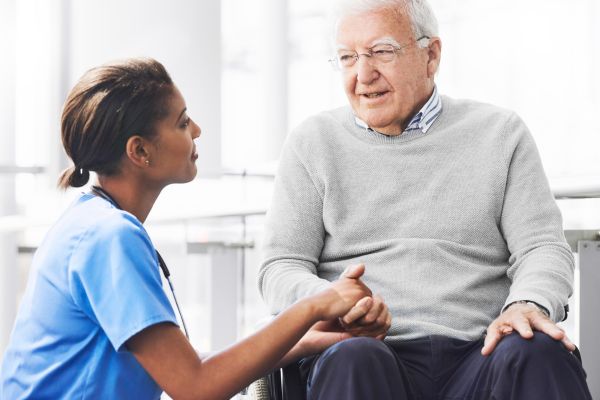 Caregiver Consoling Senior Patient Caregiver Consoling Senior Patient