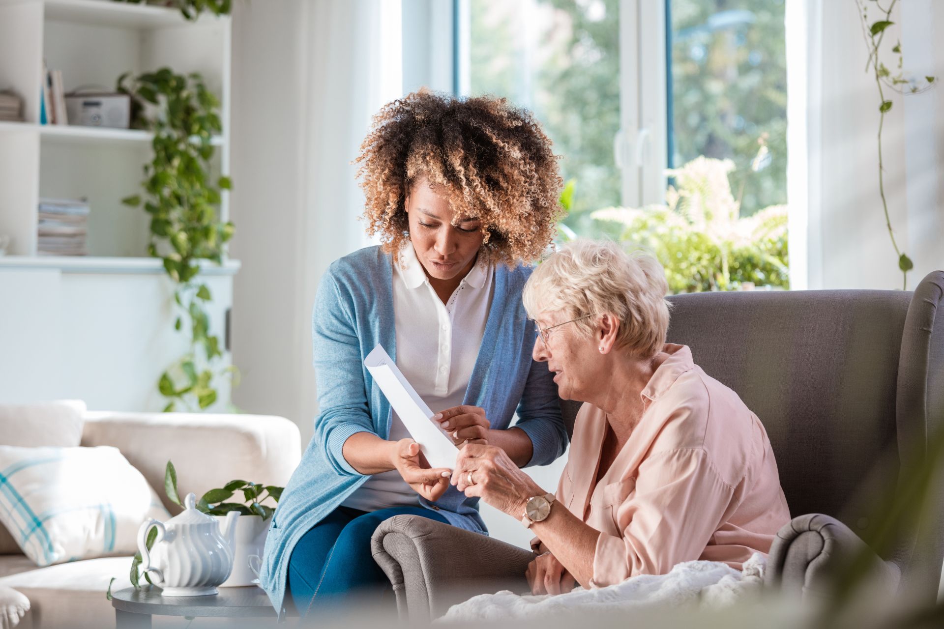 Home nurse taking care of senior woman Home nurse taking care of senior woman